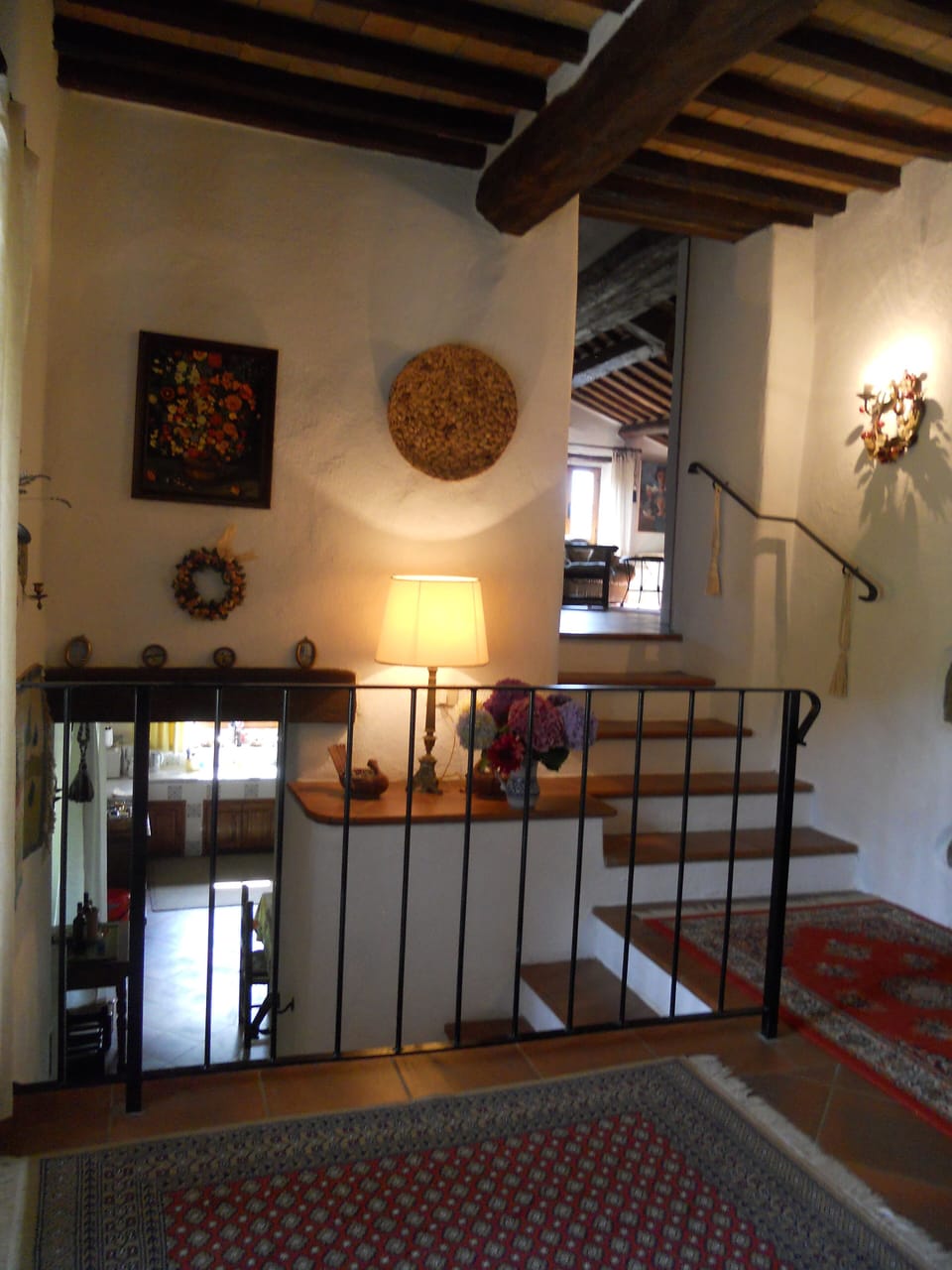 entrance with stairs up to bedroom and down to kitchen