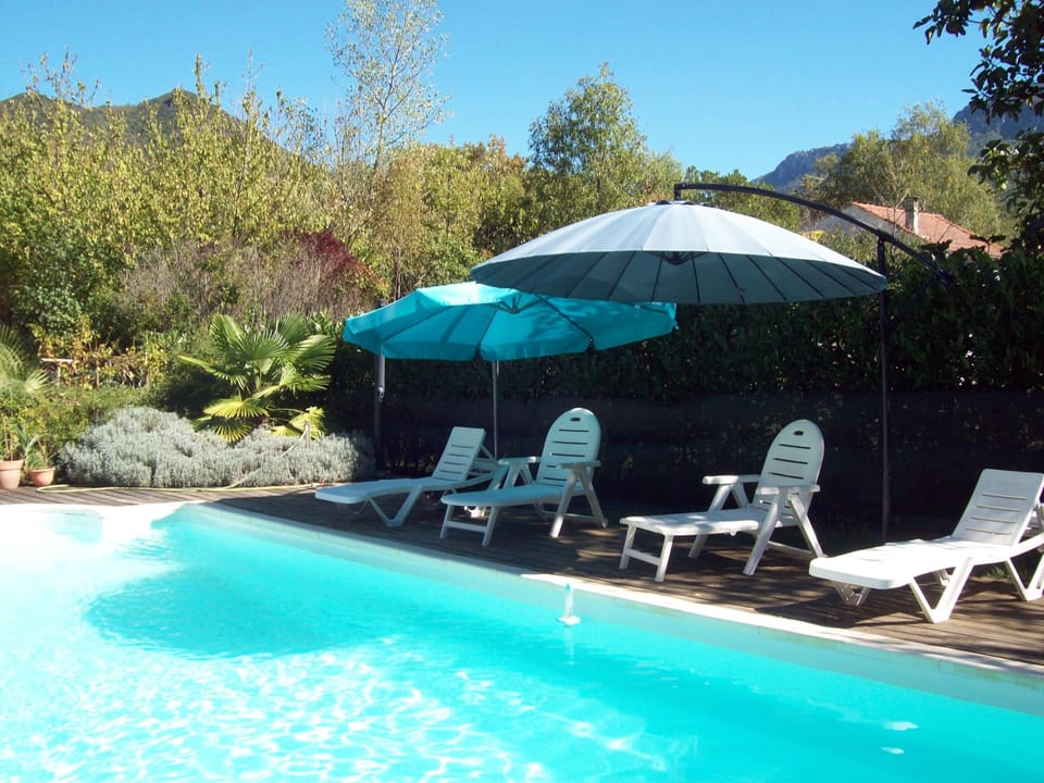 Relax by the pool with mountain views