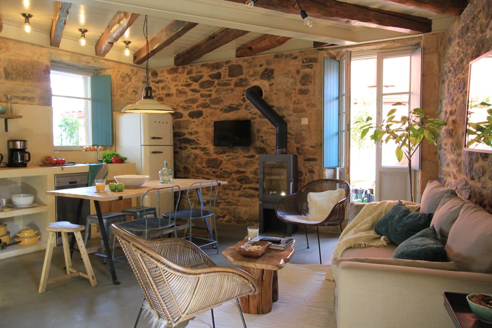 Cozy living room and kitchen with sea view and fireplace