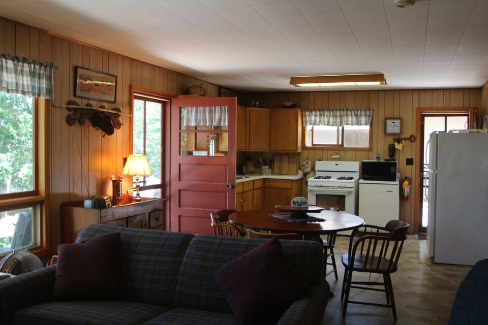 Living room and kitchen. Apologies for the dark pic; new photo coming summer '18
