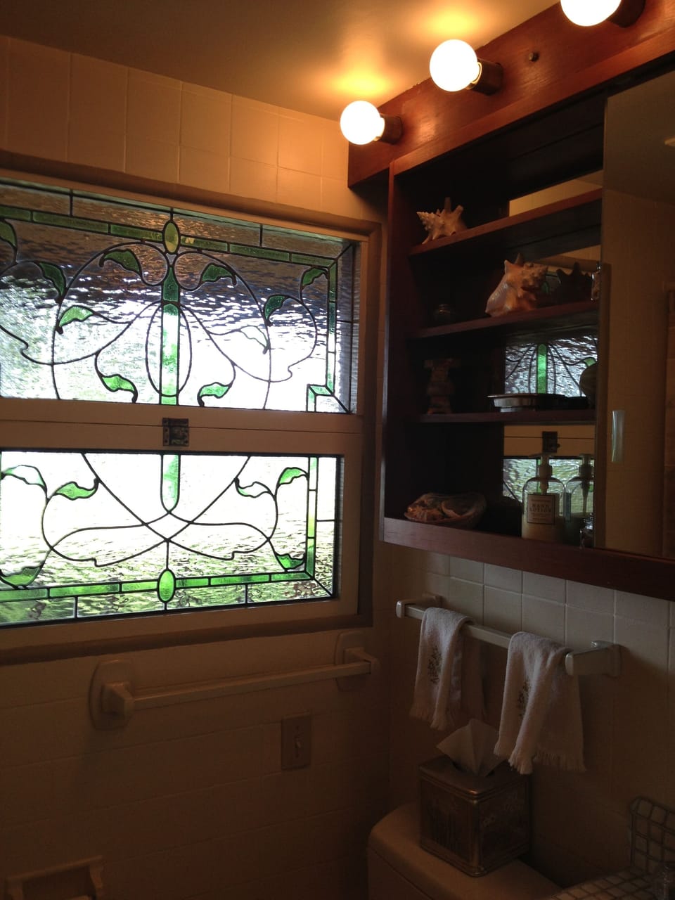 stained glass window in bathroom