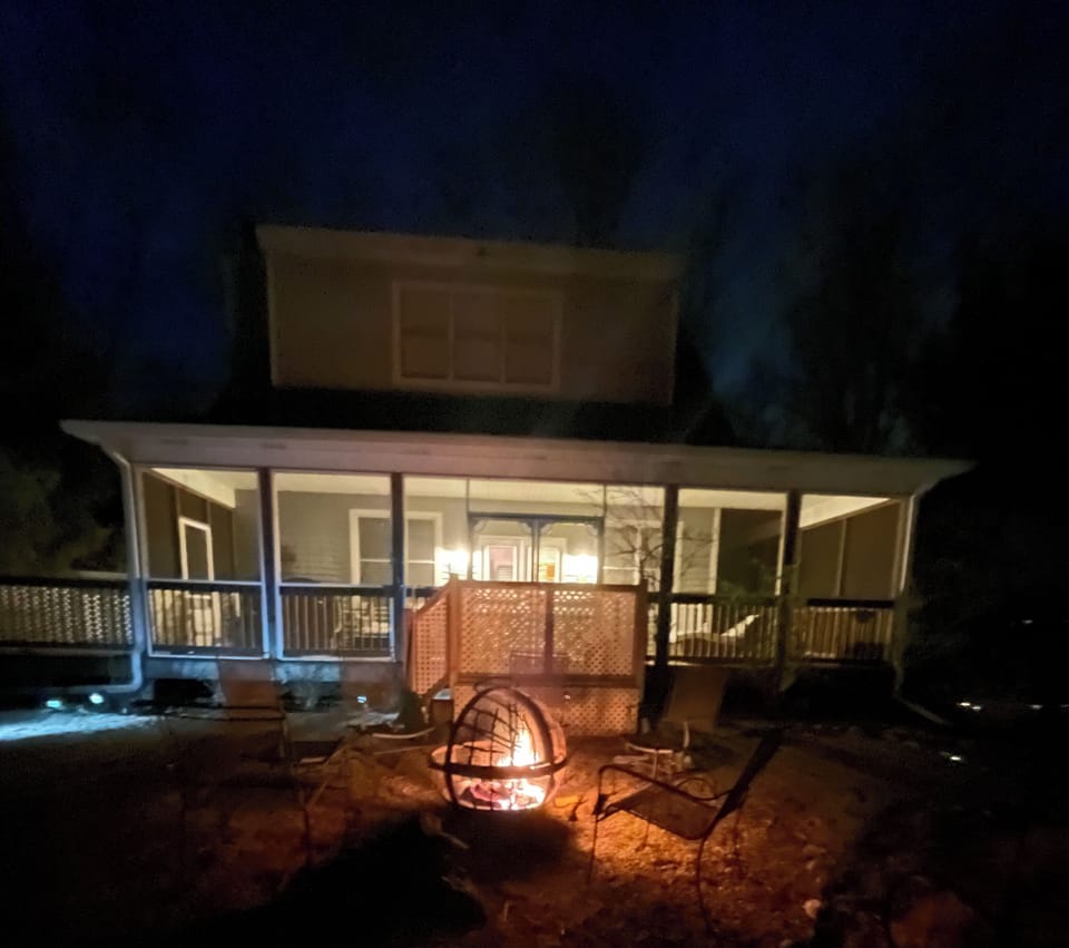 Front of house with fire pit. Beautiful evenings under the stars.