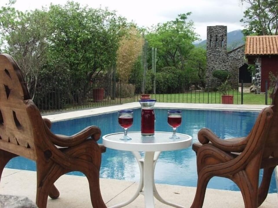 Relax by the swimming pool, view toward Chapel