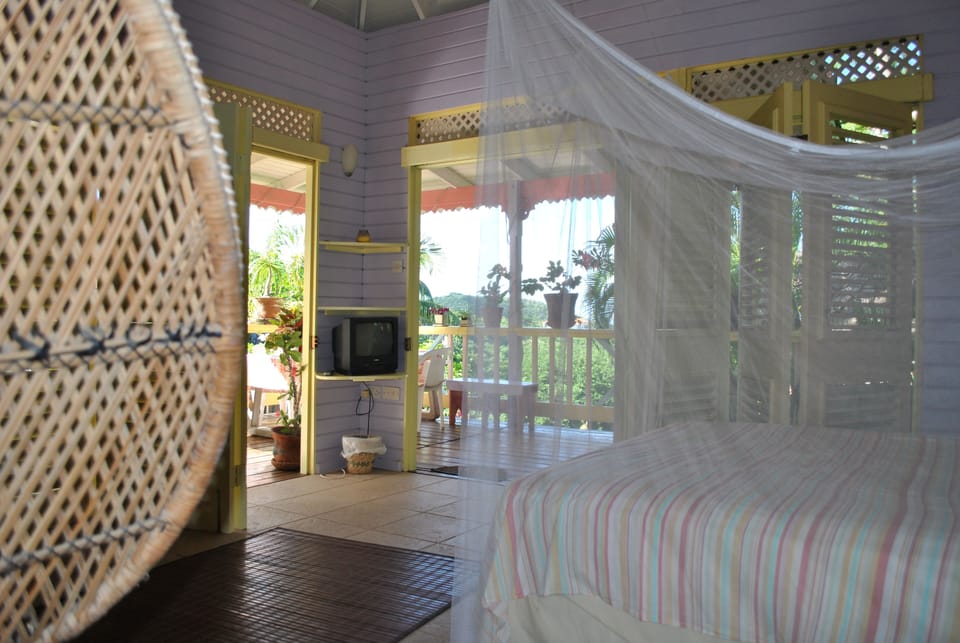 Inside Creole House with view onto terrace