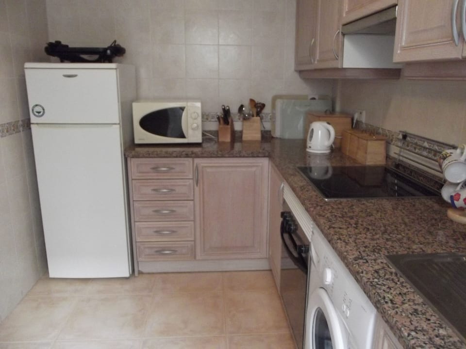 Well equipped kitchen with separate door to dining area