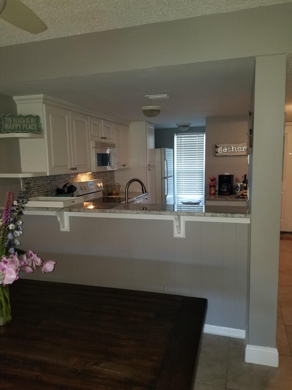 The large table seats 8 comfortably. The kitchen is open for your needs.