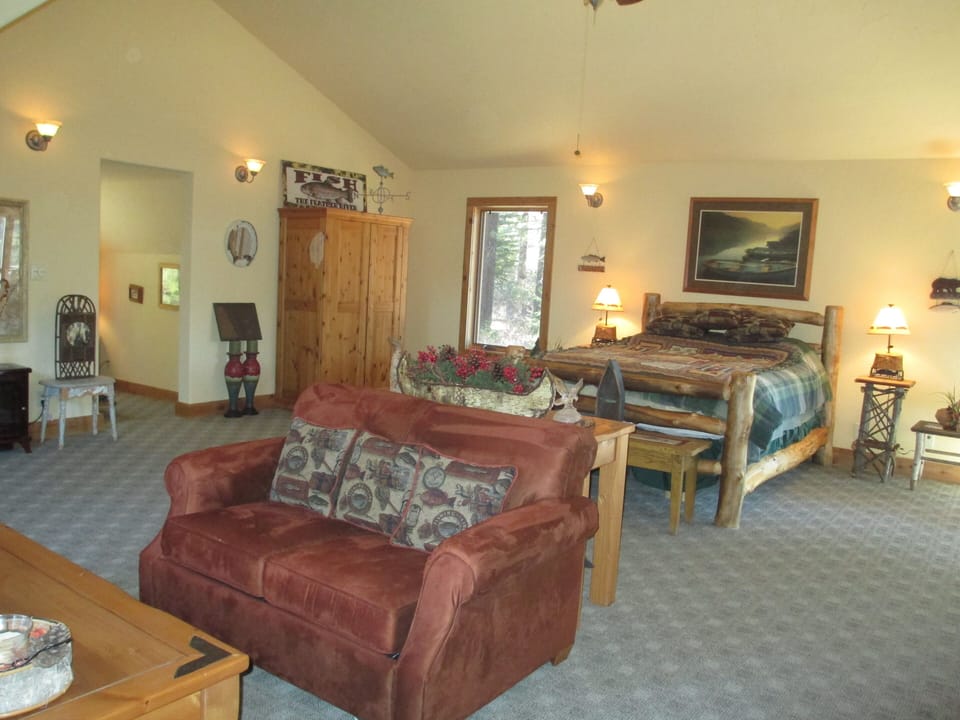 Sitting area and bedroom of studio.
