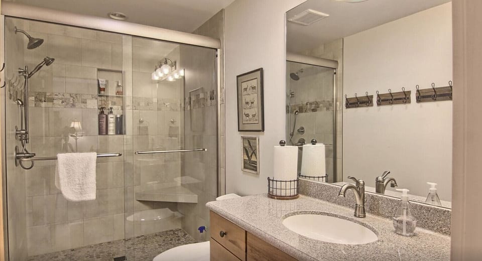 Newly added full bath next to Bud's Bunker. 
