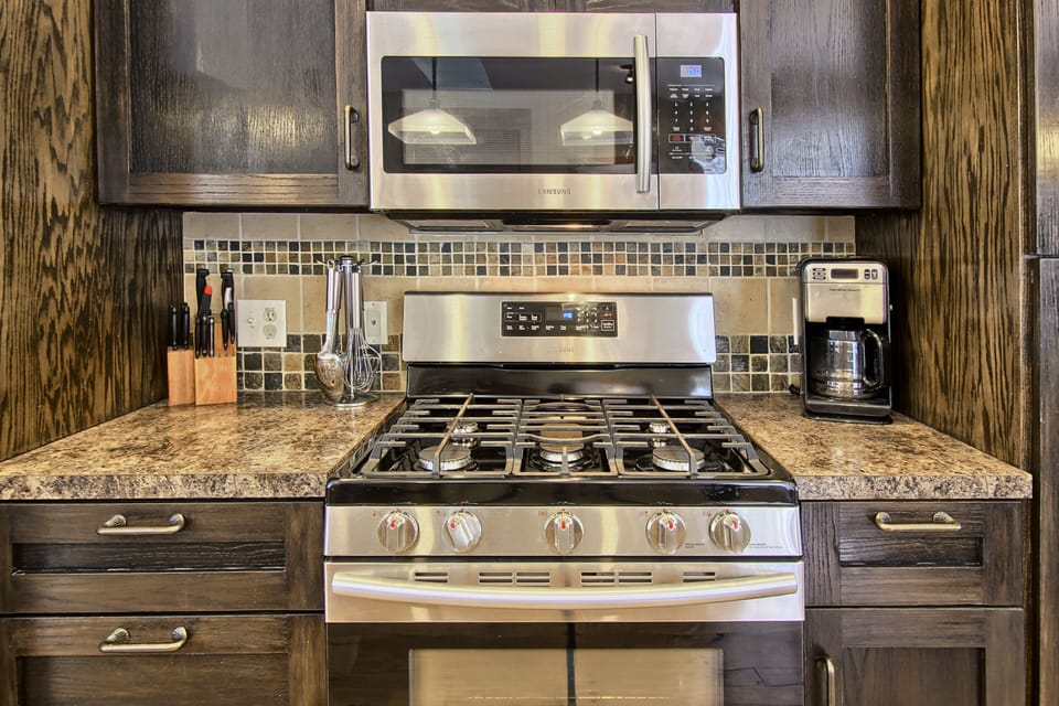 Kitchen - Everything you'll need to cook and dine plus more.  Also, a keurig coffeemaker as well as a regular drip brewer.  Stainless steel appliances.