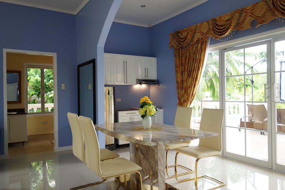 View of kitchen, dining, and terrace.