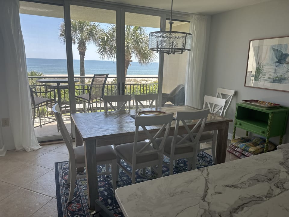 New view from newly remodeled kitchen and dinning area-New table for the space.