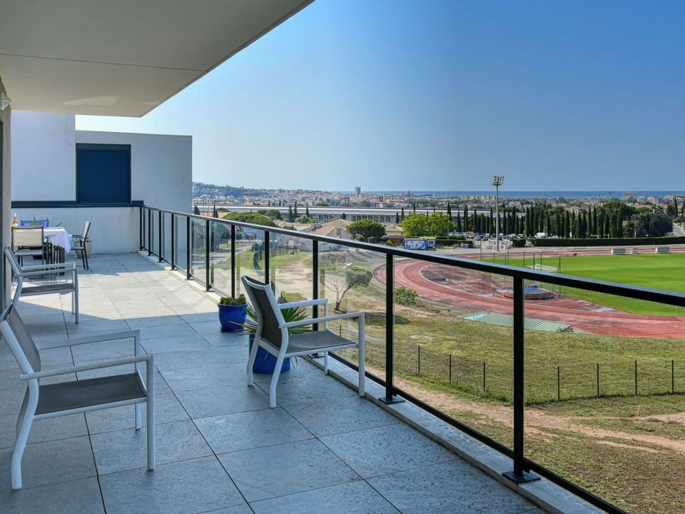 Sky, Building, Fence, Shade, Urban Design, Chair, Real Estate, City, Leisure, Condominium