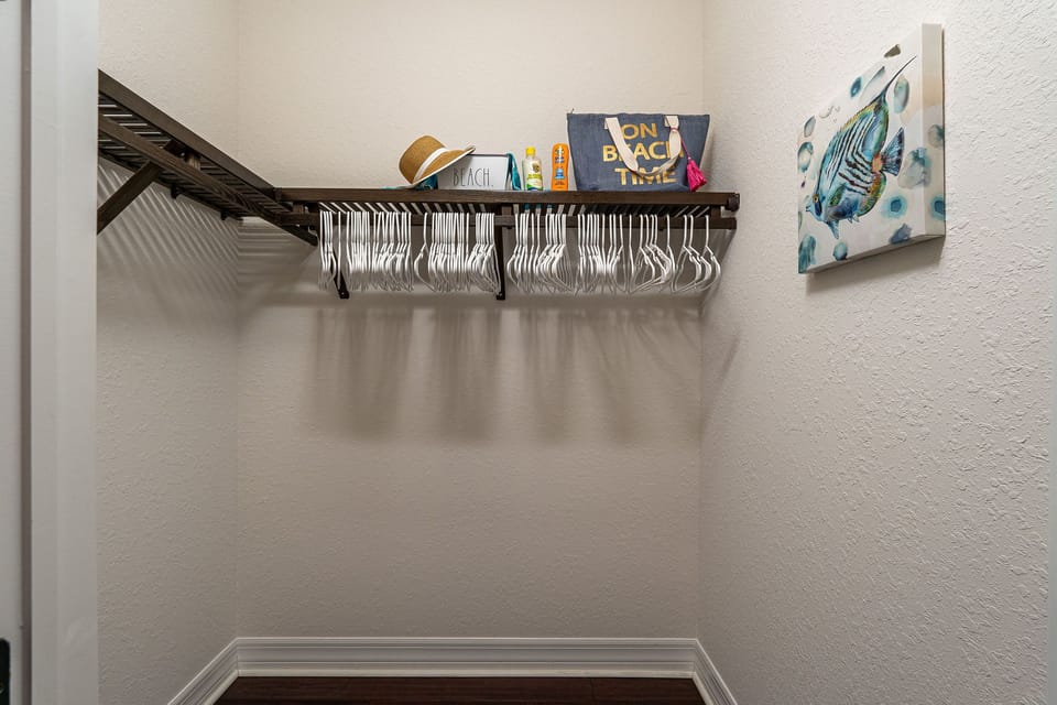 Spacious master closet...plenty of hangers are provided!