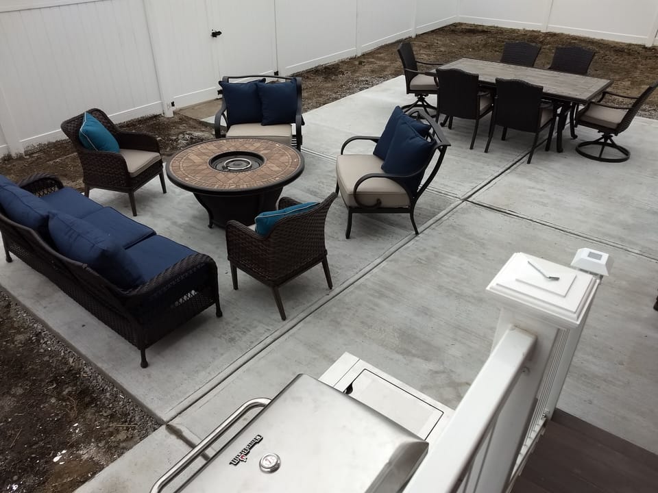 Large patio in fenced in yard with plenty of room to gather!