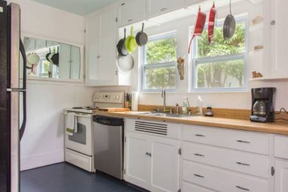 Cheerful kitchen with everything you need for cooking meals.