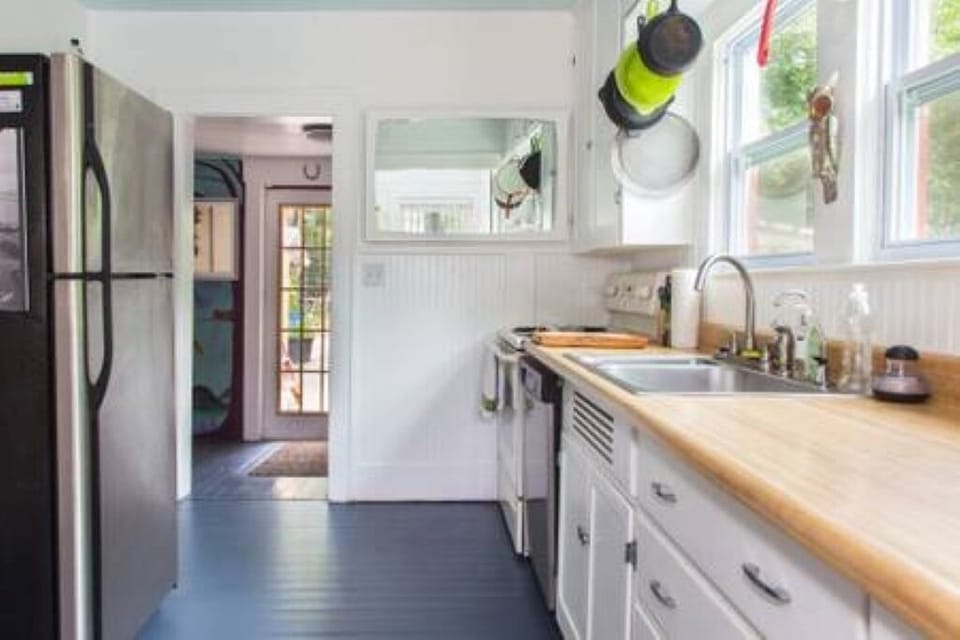 Cheerful kitchen with everything you need for cooking meals.