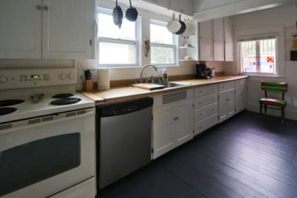 Cheerful kitchen with everything you need for cooking meals.