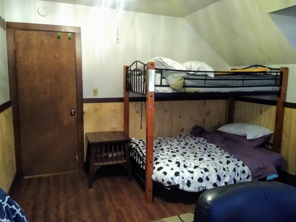 Twin size bunk bed (upper) full size futon (lower)