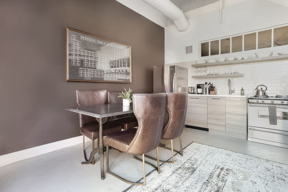 Dining Area and Kitchen at Ponce City Market Apartment