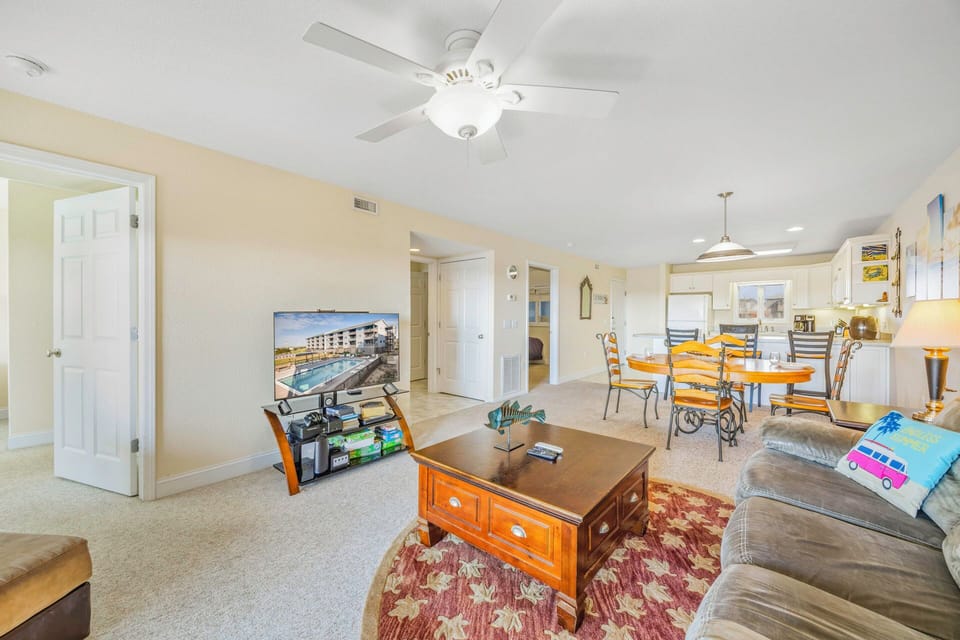Your spacious open-plan retreat combines comfort and convenience, where you'll enjoy cooking in the modern kitchen and relaxing in the bright living area.