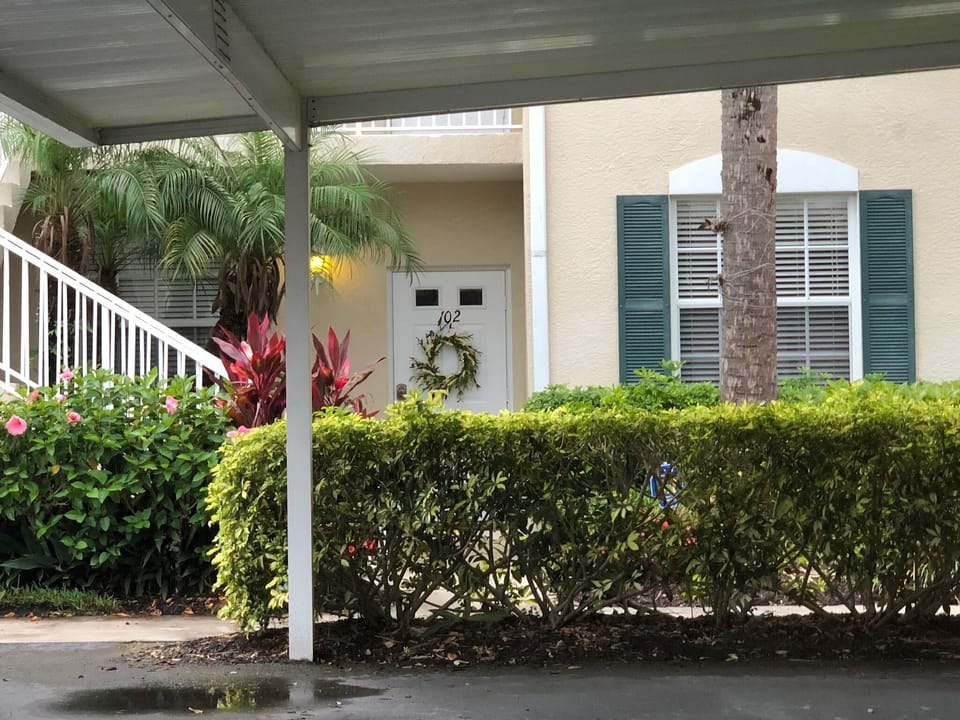 Front Door of Unit & Carport