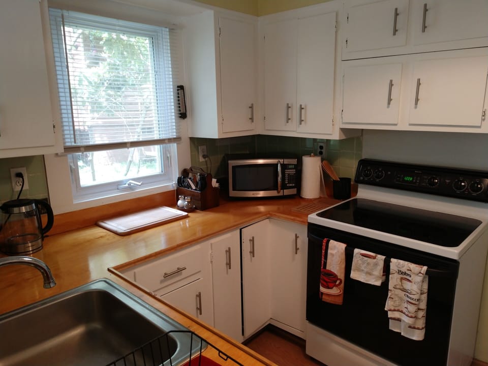 Fully appointed kitchen with ALL NEW APPLIANCES, CUTLERY, FLATWARE, etc.