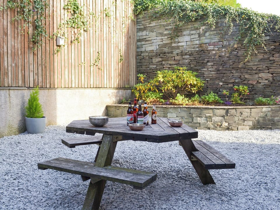 Courtyard garden with outdoor furniture | Rolton House, Ambleside