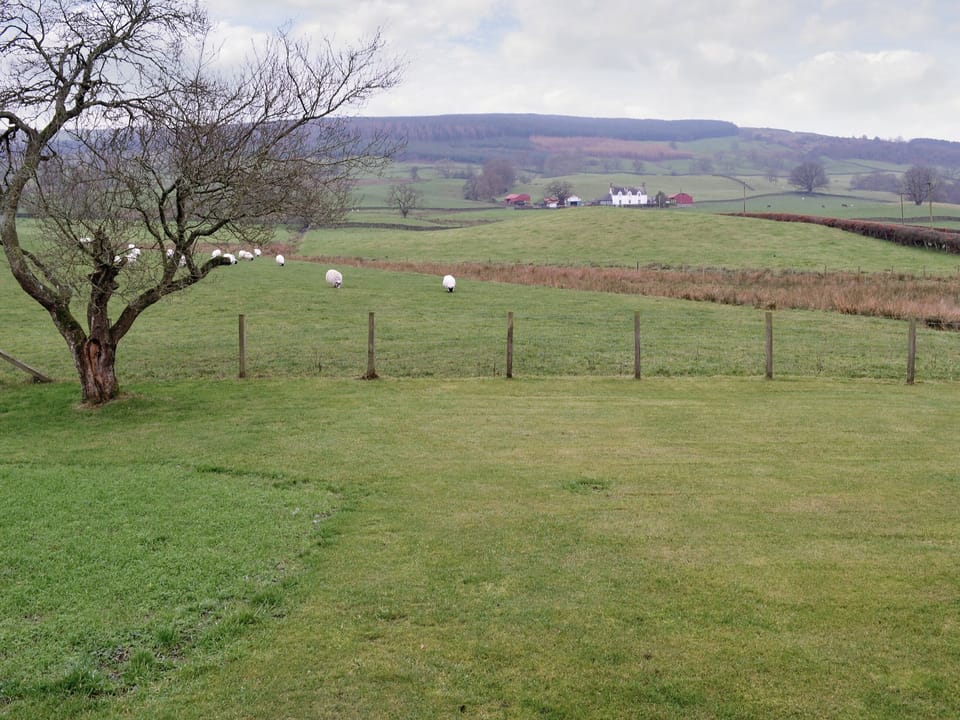 Outstanding rural views from the garden | Beuchan Bungalow - Beuchan Farm, Keir Mill, Thornhill