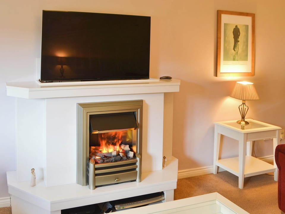 Delightful contemporary fireplace | Hawthorne House, Amble, near Warkworth