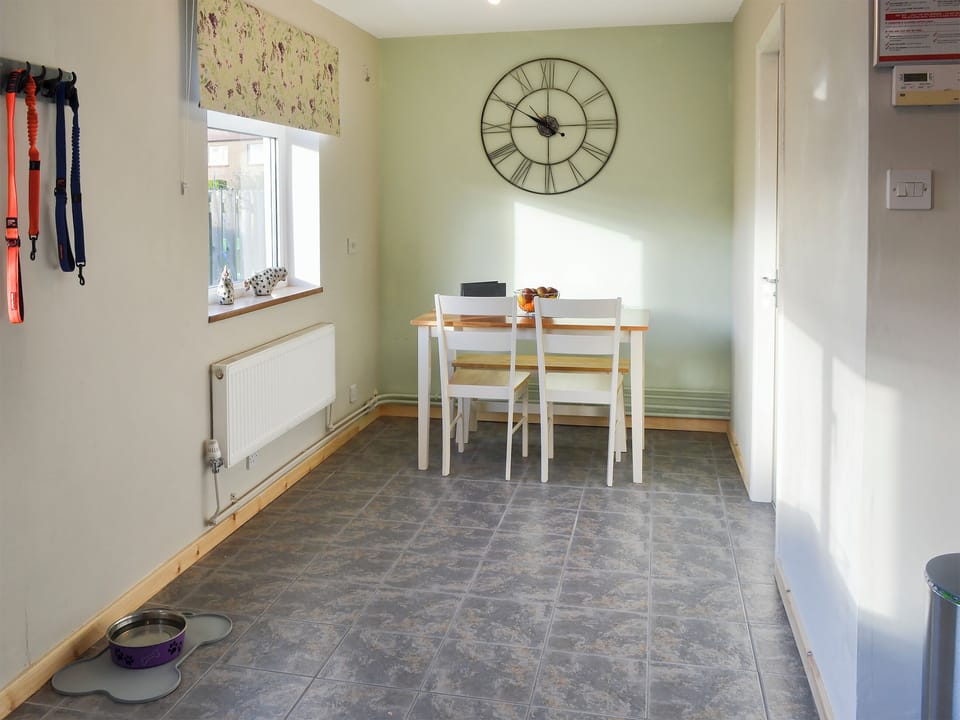 Kitchen with breakfast area | Waggy Tails, Seahouses, near Alnwick