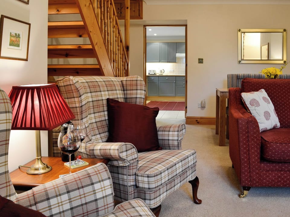 Living room with wood burner | Rose Cottage, Betws-y-Coed