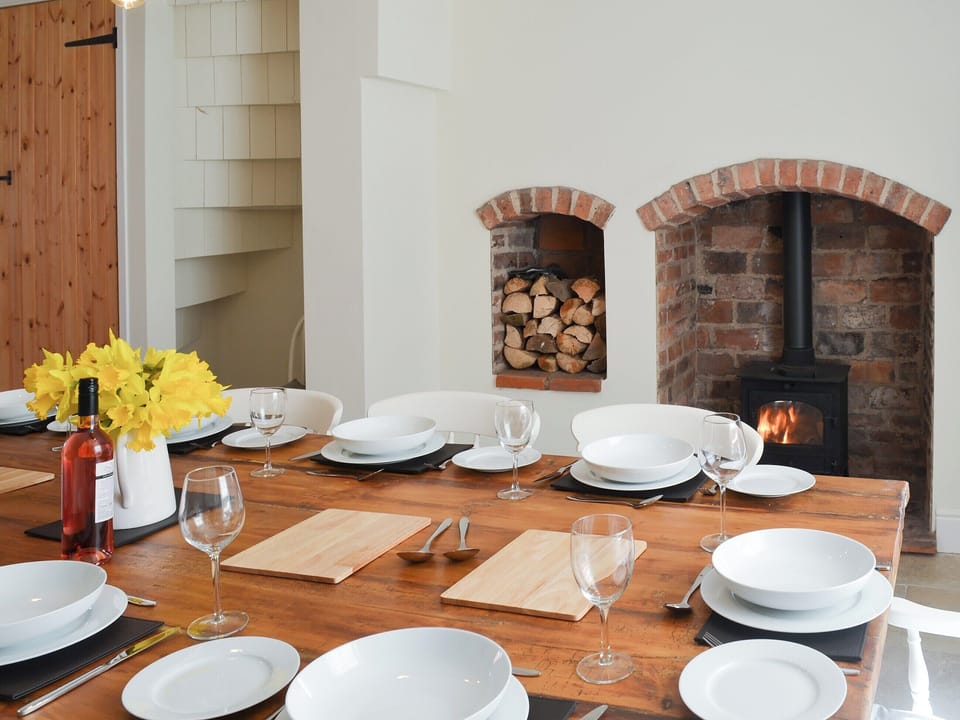 Lovely dining room and quirky firepalce | West House Farm, Muston, near Filey