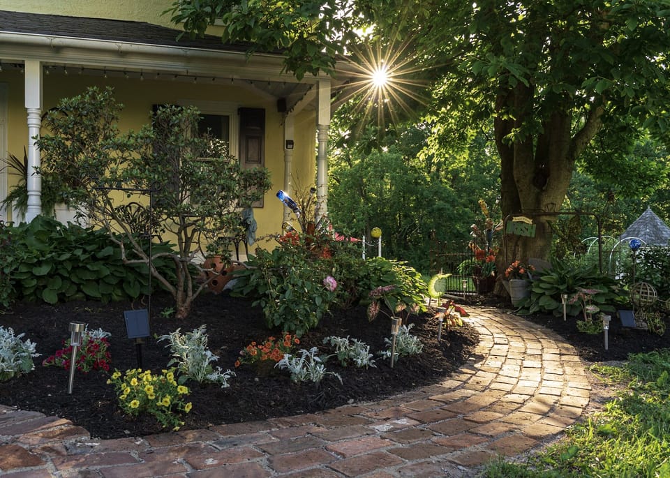 Just around this garden bend is the private entrance. 