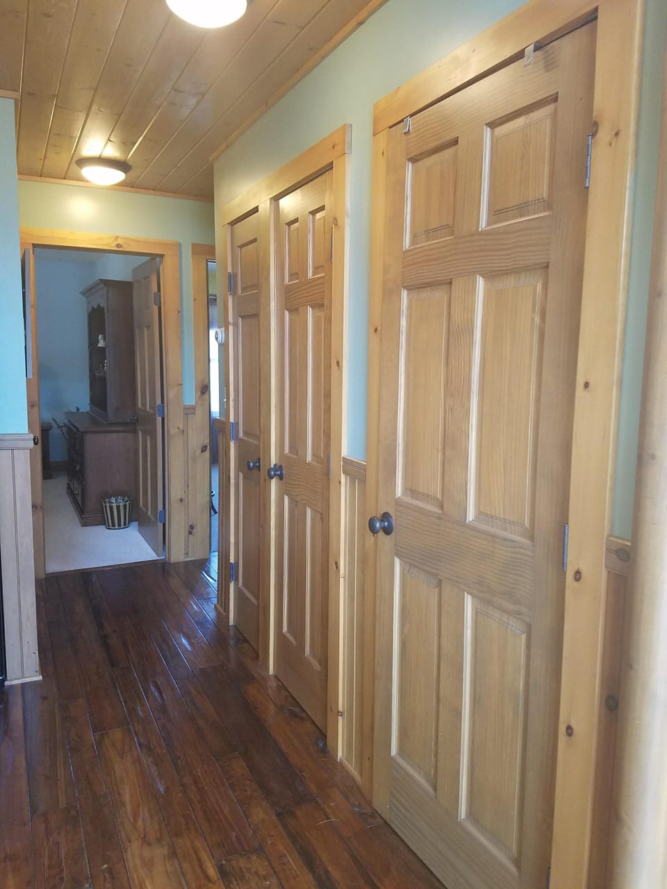 Hallway to the bedrooms, including pantry and closet.