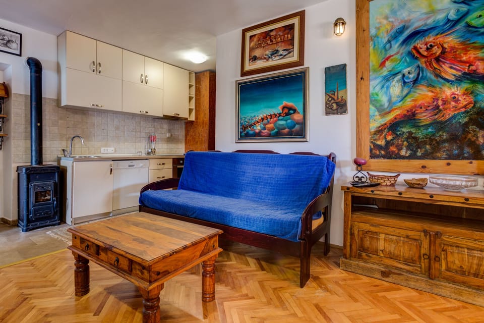 Living room and kitchen share the same area, just to gather all the family 