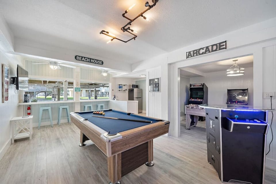Enjoy this game room with a variety of games