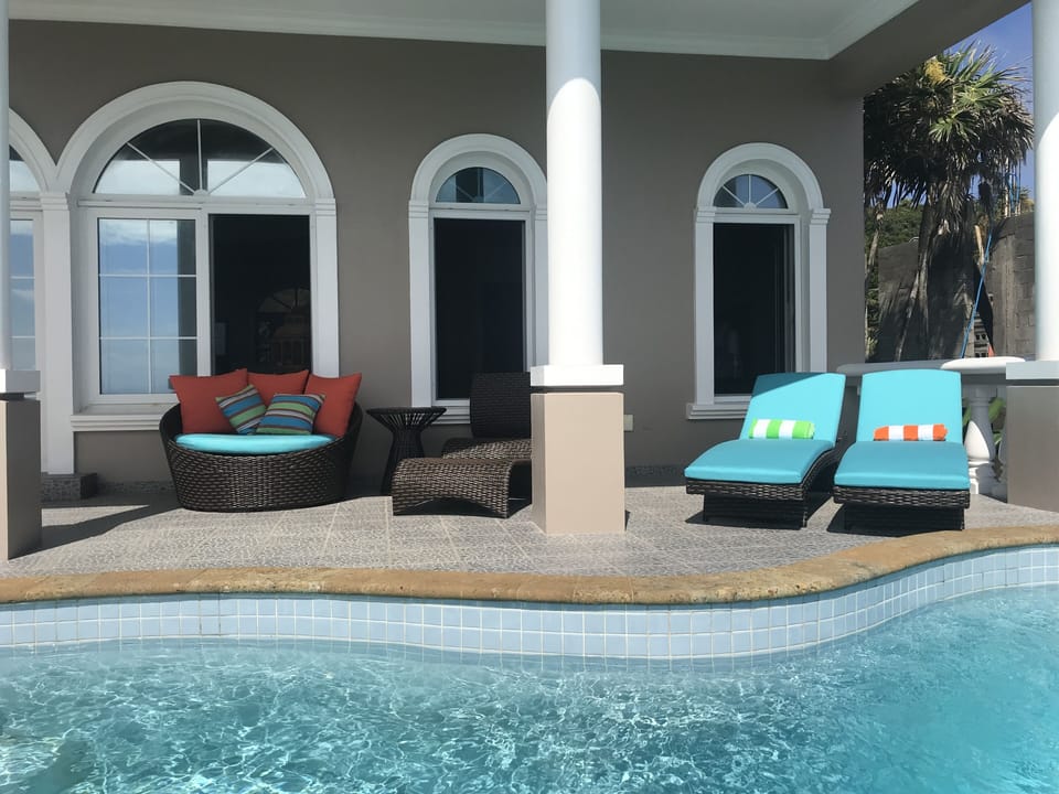 Lounge chairs on pool deck