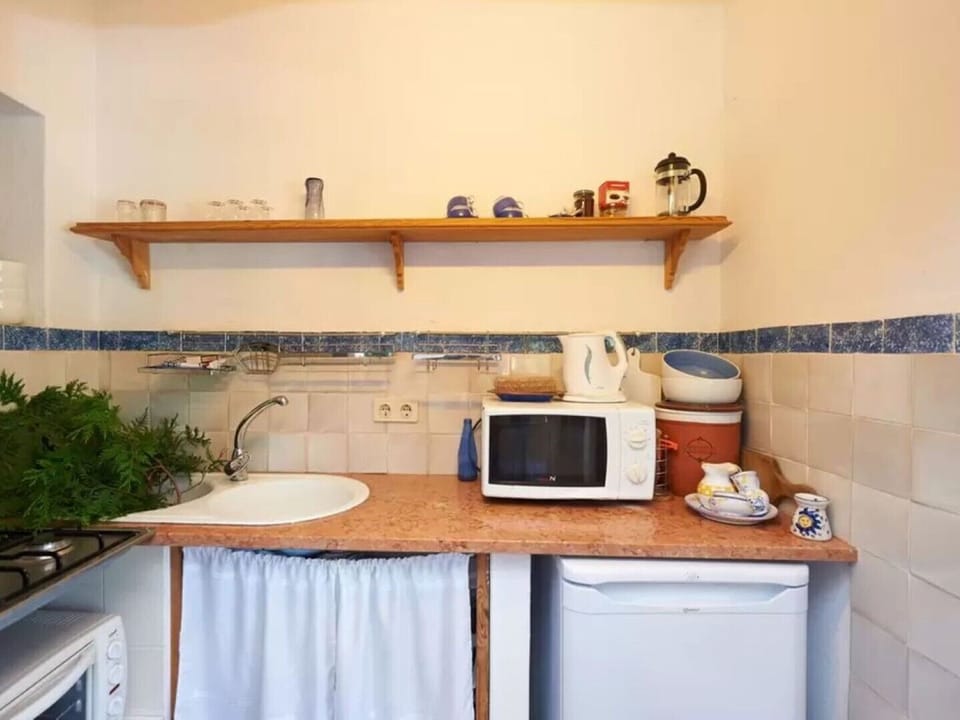 CASA NAS NUVENS
Lower Apartment 
Kitchenette 