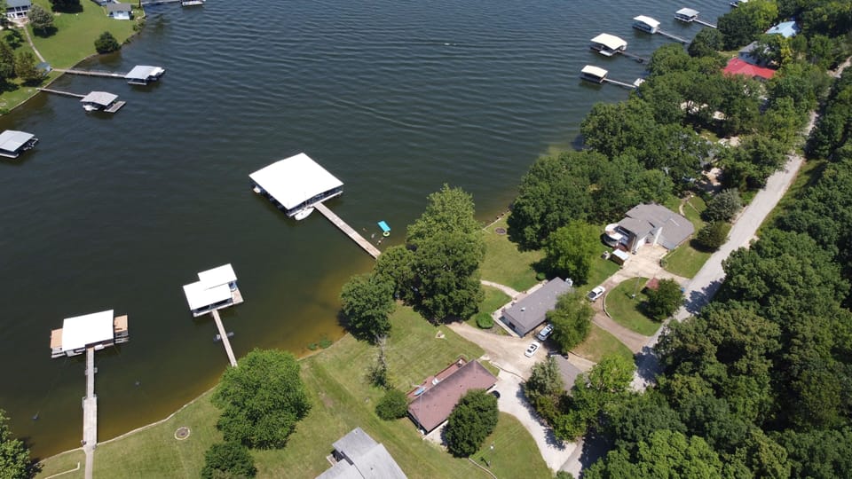 Peaceful cove (we have the large shared dock), Hook House to the left.