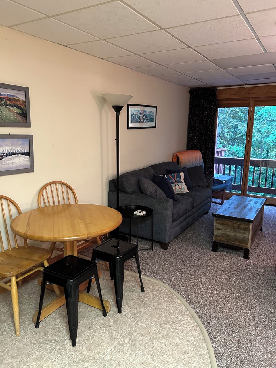 Family Room, fold out sleeper sofa (new in 2023) and Kitchen Table 
