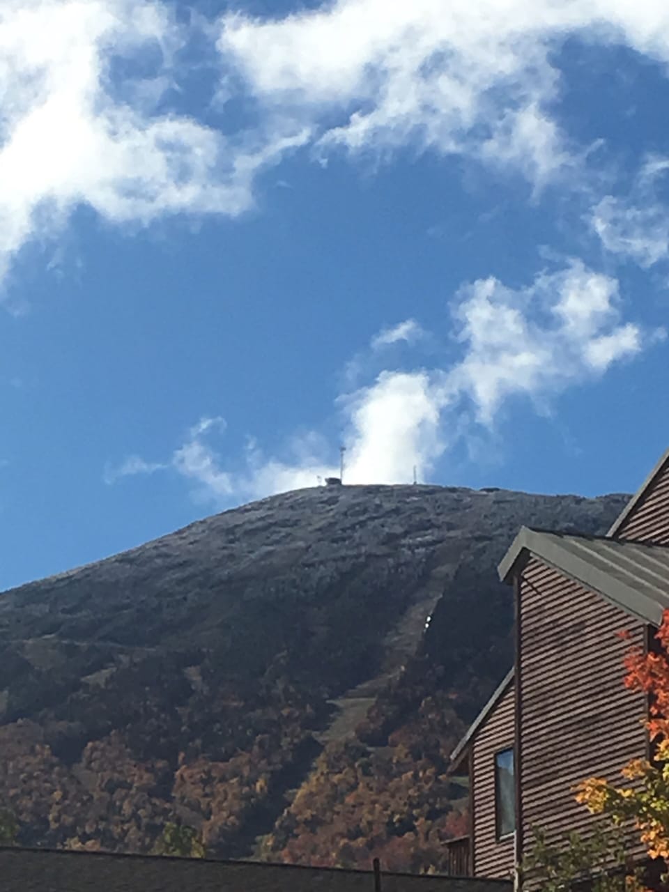 Looking up at the summit from Snubber mid station. That's our condo on the right