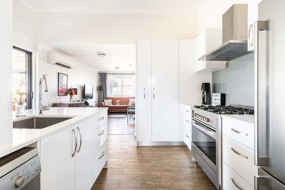Fully equipped kitchen with all glassware, dinnerware, cookware and more.