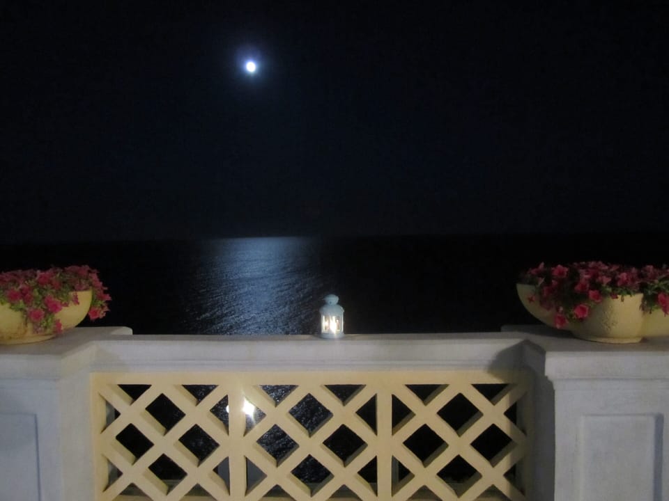 terrace and the sea by night
