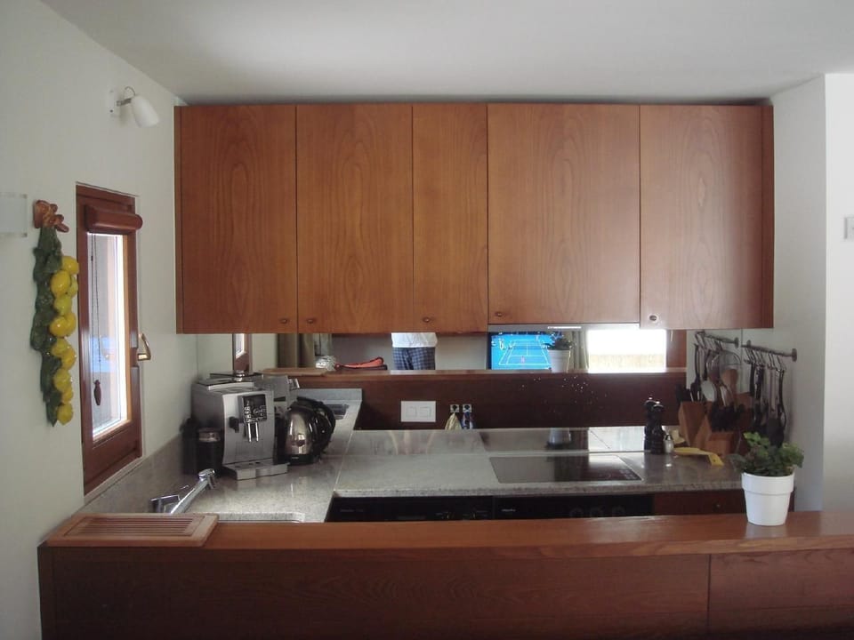 View kitchen; Oven and dishwasher, fridge with separate freezer compartment are available