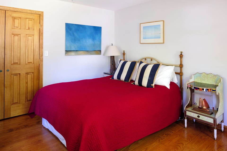 First-floor Queen bedroom, with views of the front and side gardens