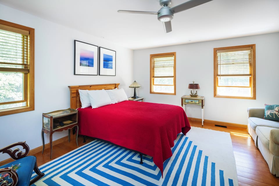 Second-floor Master Bedroom, with views of the back and side gardens