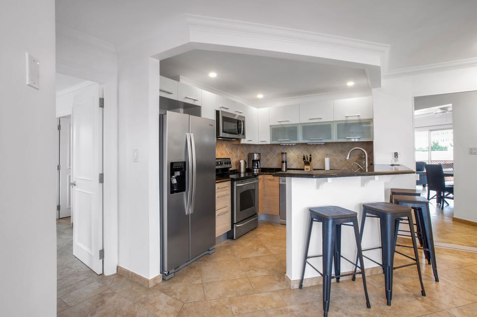 Kitchen opening to the dining and living room area.