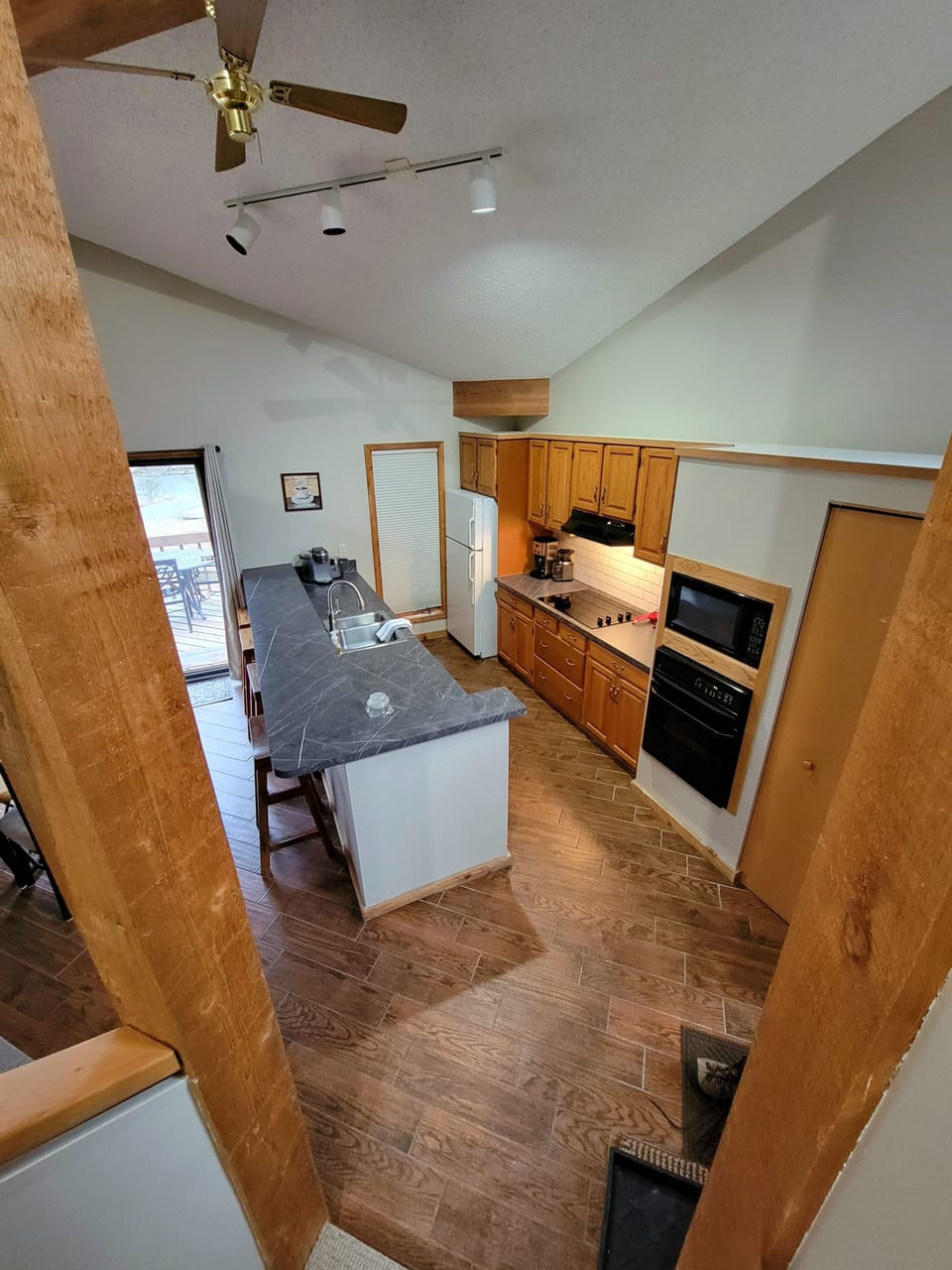 View of kitchen from stairs