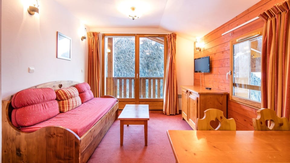 Sit back and relax in the cozy and open living area after a day outside.