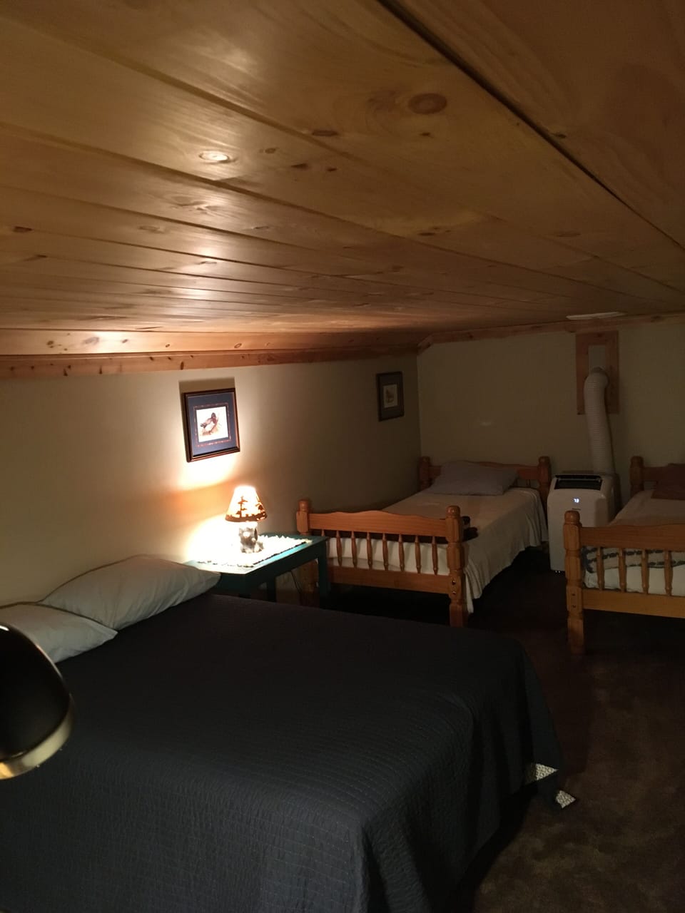 Loft bedroom. 2 twin beds and 1 full size bed. 